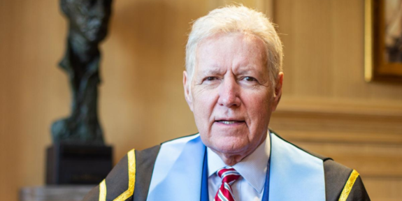 Alex Trebek poses in the Presidential robes of the RCGS